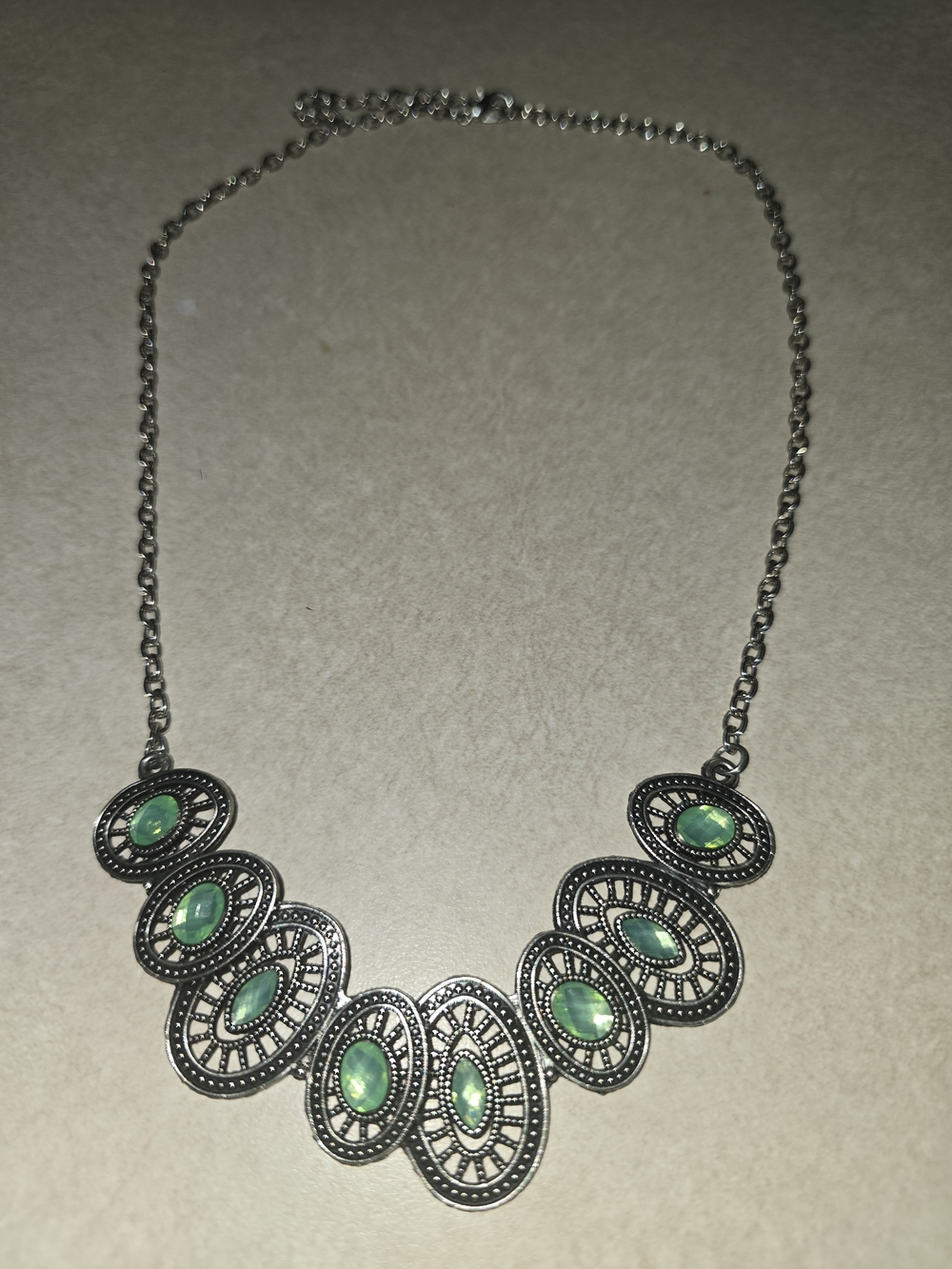Silver-Tone Necklace with Green Gemstone Accents